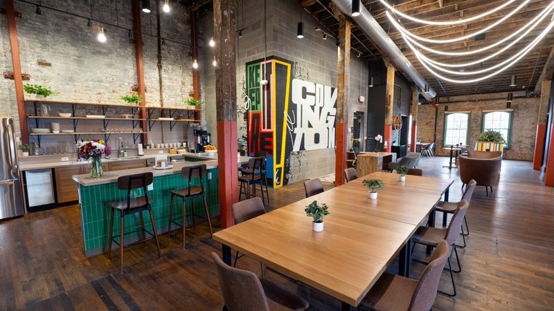 Office space Covington, Kentucky: COhatch Covington shared lounge and tables