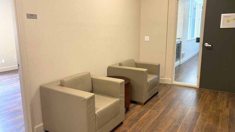 office space healdsburg - breakout area and private office door at 375 Healdsburg Avenue